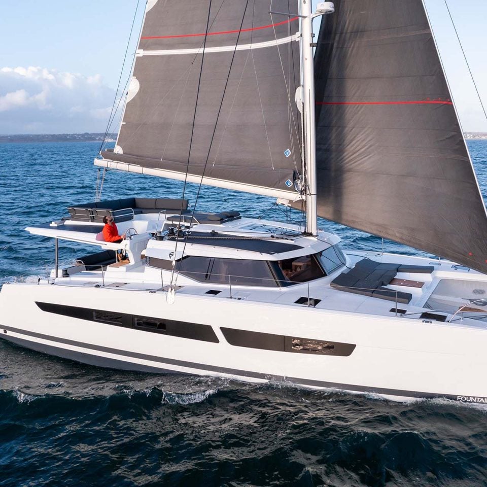 Fountaine Pajot Aura 51 catamaran cruising with sails up