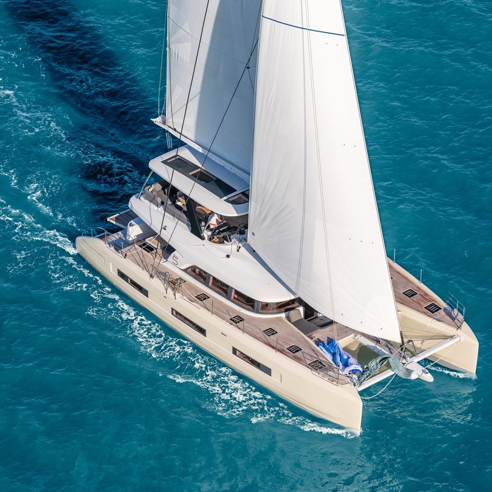 Aerial view of the Lagoon sixty 5 luxury catamaran at sail