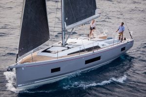 Beneteau Oceanis 46.1 yacht under sail with couple aboard