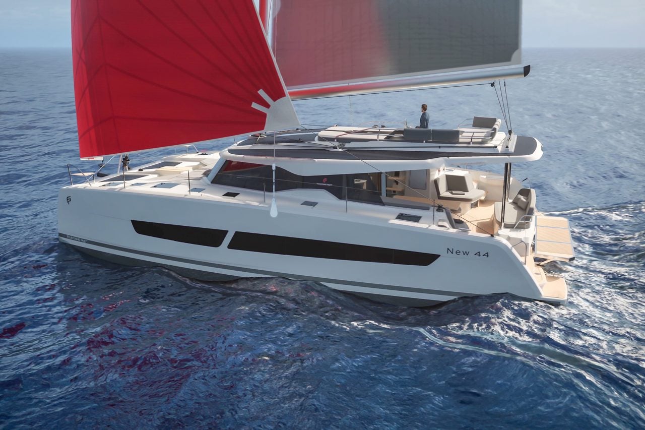 Fountaine Pajot 44 catamaran sailing with man at helm